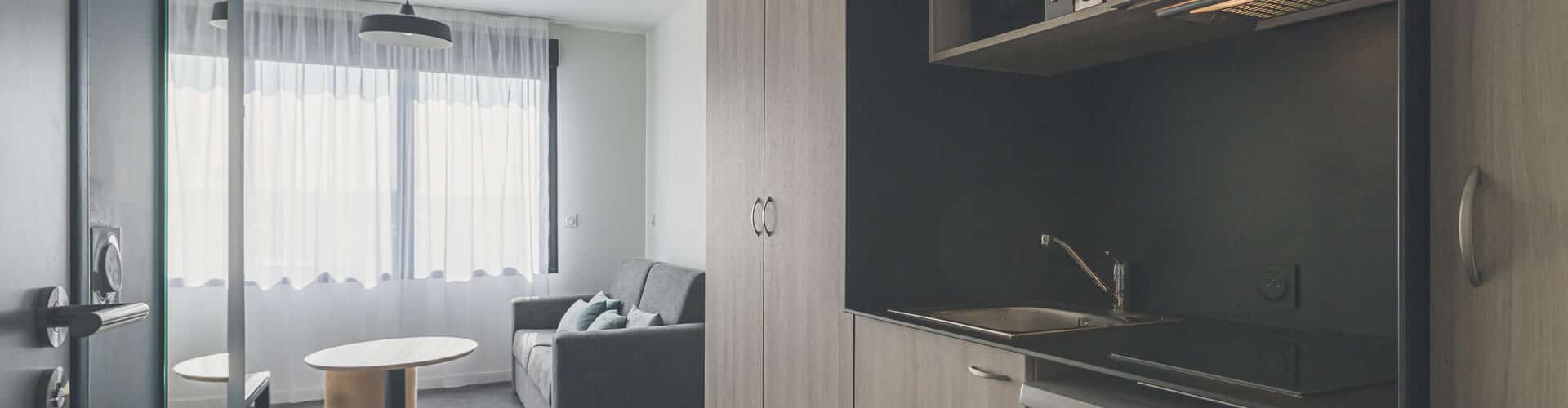 Modern, fully furnished and equipped apartments at Whoo Residence Bordeaux Bacalan, offering flexible and studio living spaces with dedicated living rooms and kitchens