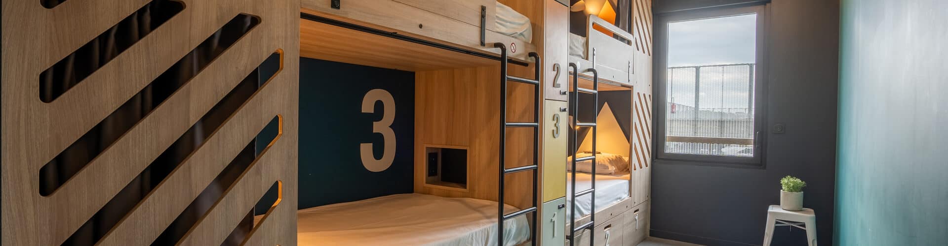 Dortoir privatisable et confortable à l’hostel Whoo Bordeaux Bacalan, une solution flexible pour groupes ou voyageurs en solo.