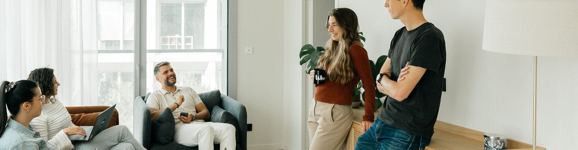Stylish shared living space in a coliving apartment at Whoo Residence Rennes Gare, designed to foster connection, comfort, and modern urban living for young professionals and students.